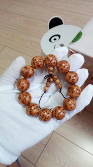 请问这个崖柏手串属于精品还是极品 大概什么价位 去掉配饰58克多,希望有明白的帮我解答